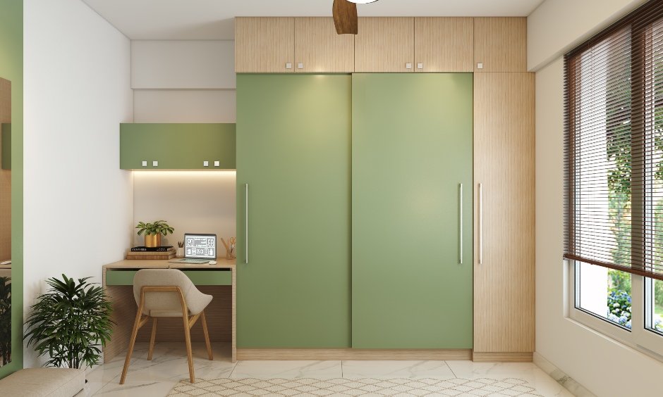 2bhk flat bedroom has small study unit and sliding wardrobe doors