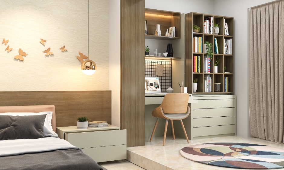 2bhk home interior design with study room adjoining the master bedroom in an open plan is designed with an ergonomic study desk
