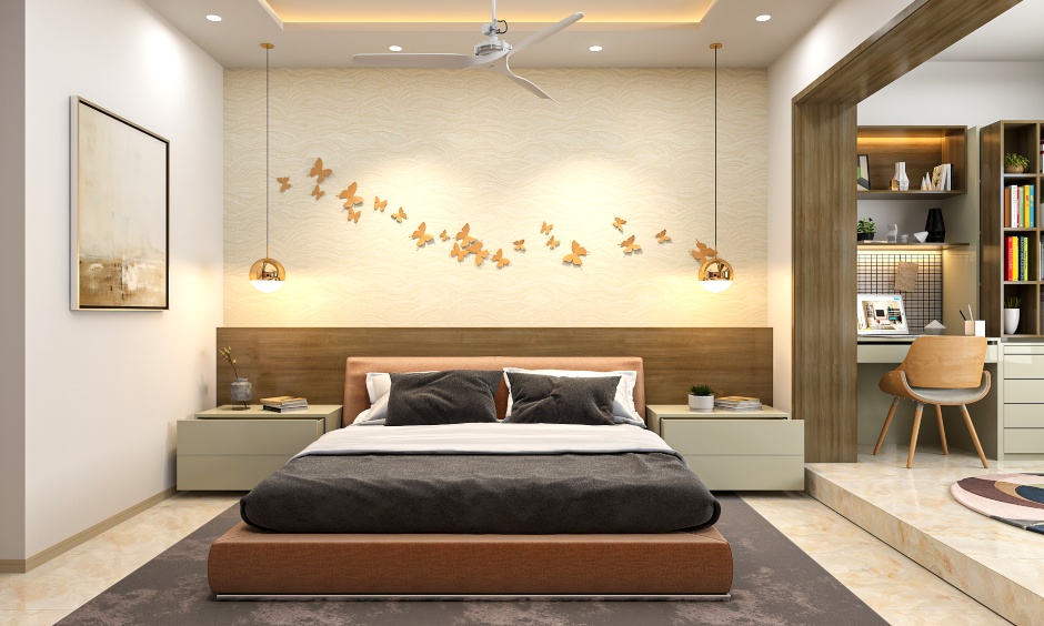 2bhk interior design master bedroom is designed with a platform bed with side tables on either side