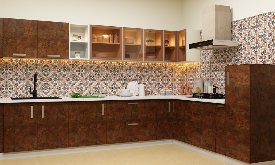 Stylish brown kitchen cabinets paired with a patterned backsplash, offering elegance and versatility