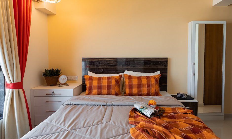 A cozy bedroom designed by budget interior designers in mumbai