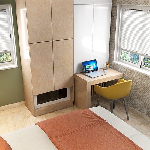 Budget interior designers in Kolkata designed a wardrobe with a pull-out study table