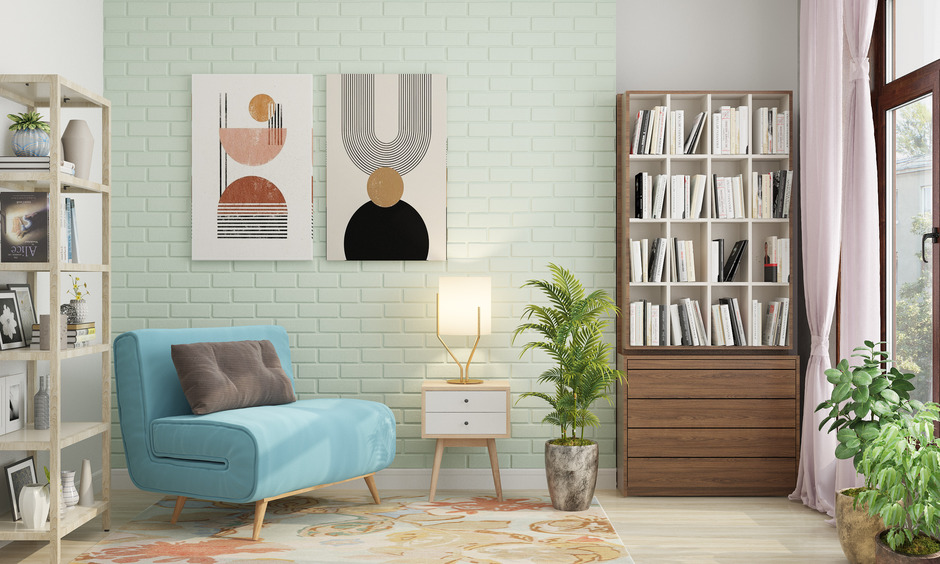 Blue folding leisure chair in a mid-century-style room paired with a white bookshelf for a stylish, serene setup.