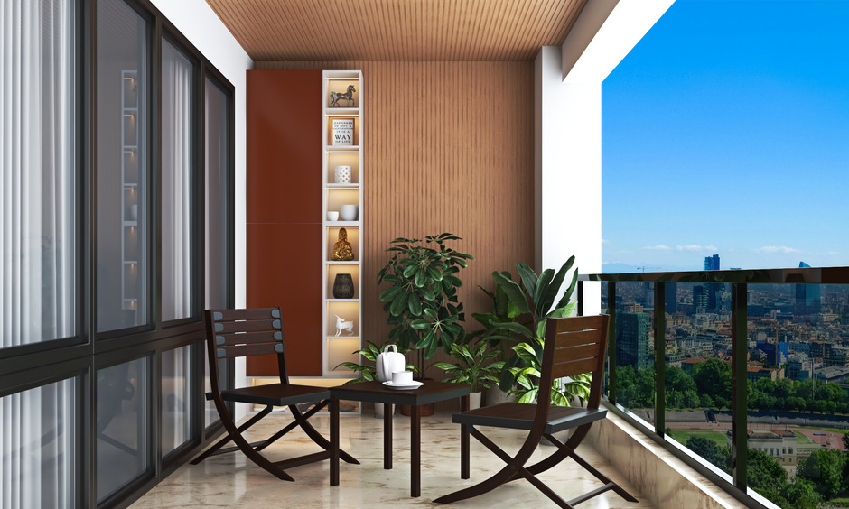 Folding relax chairs on a balcony with a bookshelf creates a cosy spot for outdoor reading and relaxation