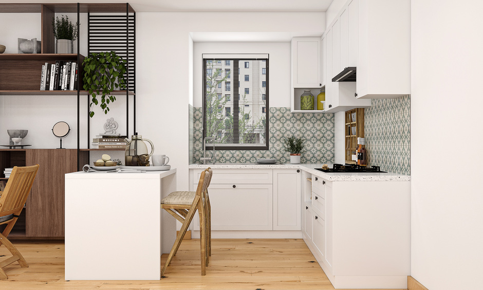 Brown folding stool chair adds style and functionality to a white matte kitchen with wooden accents, enhancing decor.