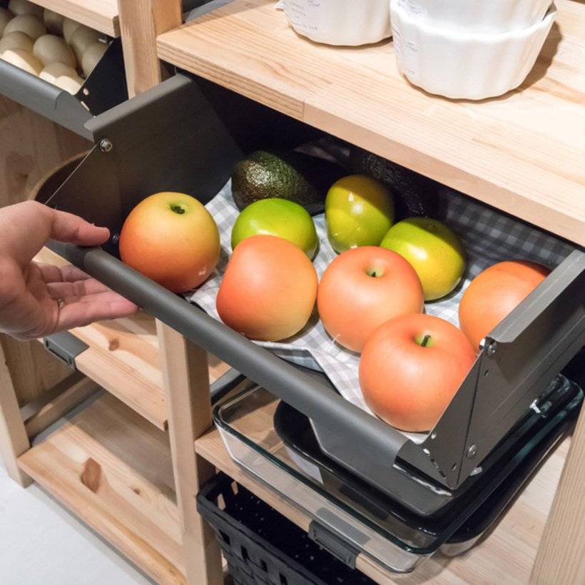 Kitchen shelf organizer with additional storage and pull out trays to store fruits and vegetables with horizontal partitions in kitchen shelf organiser