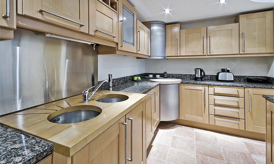 Modern kitchen with 2025 kitchen sink trends, highlighting two sinks for efficiency and style