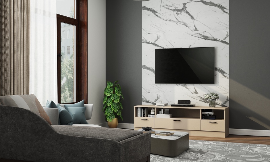 Marble sunmica TV unit complementing grey-toned living room decor and a matching coffee table for a sleek aesthetic.