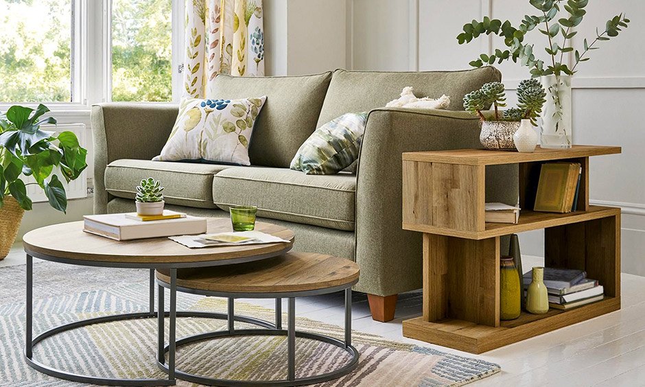 The modern kid friendly living room features a round nested coffee table The modern kid friendly living room features a round nested coffee table