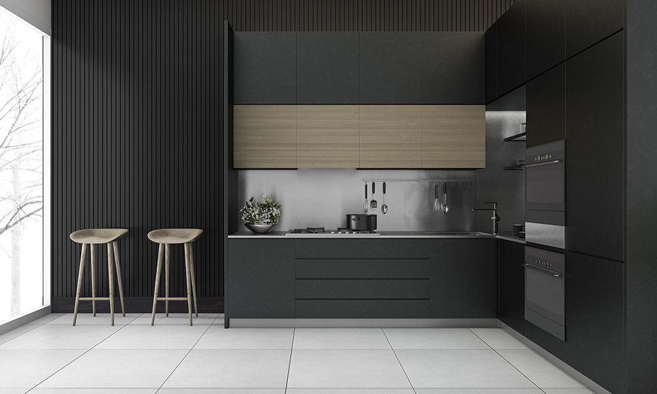 Modern luxury black kitchen design with elegant organisation, natural wood accents, and bold style