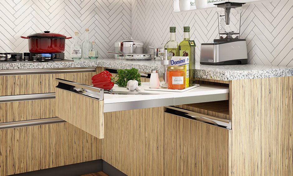 Multipurpose furniture design with a sturdy, durable chopping board pulls out in a kitchen