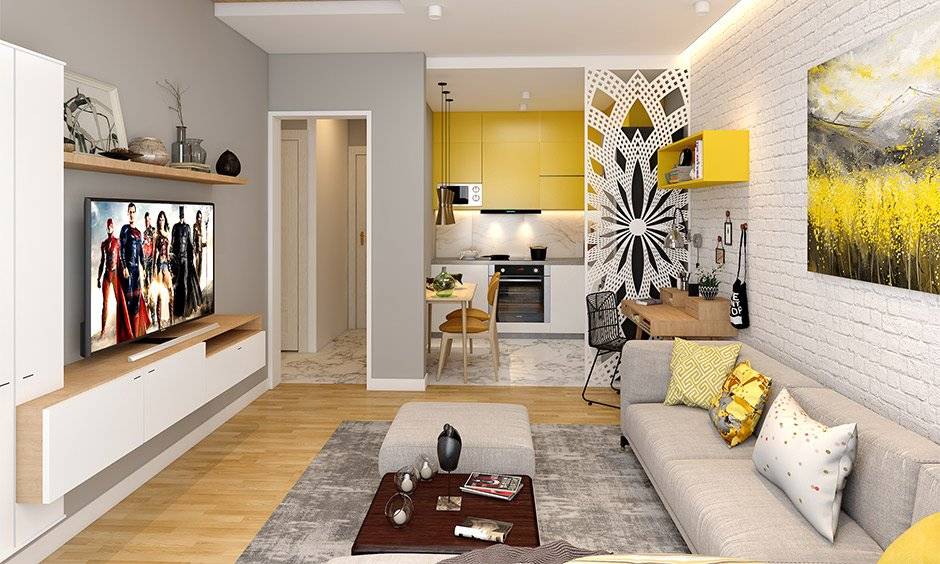 Choose an open layout for a rectangular living room and add a jaali partition between the living room and kitchen Choose an open layout for a rectangular living room and add a jaali partition between the living room and kitchen