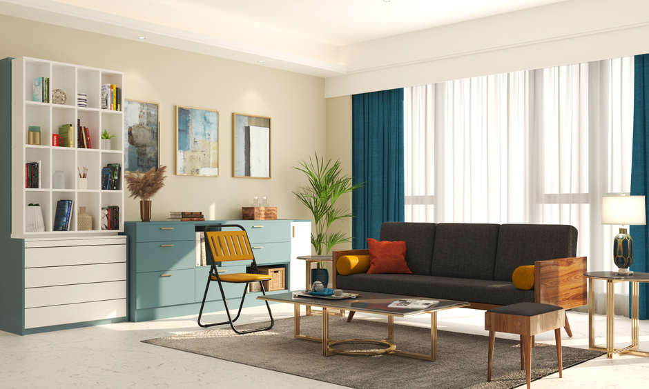 Plastic folding chairs complement a three-seater sofa, providing stylish, lightweight seating for gatherings in any room.