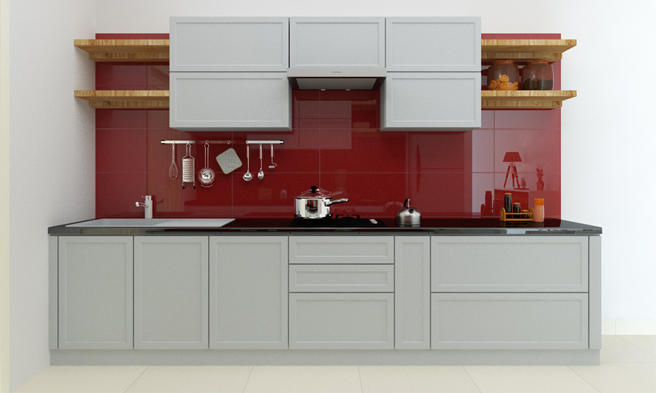 Red and white modular kitchen designs create a bold and stylish modern cooking space