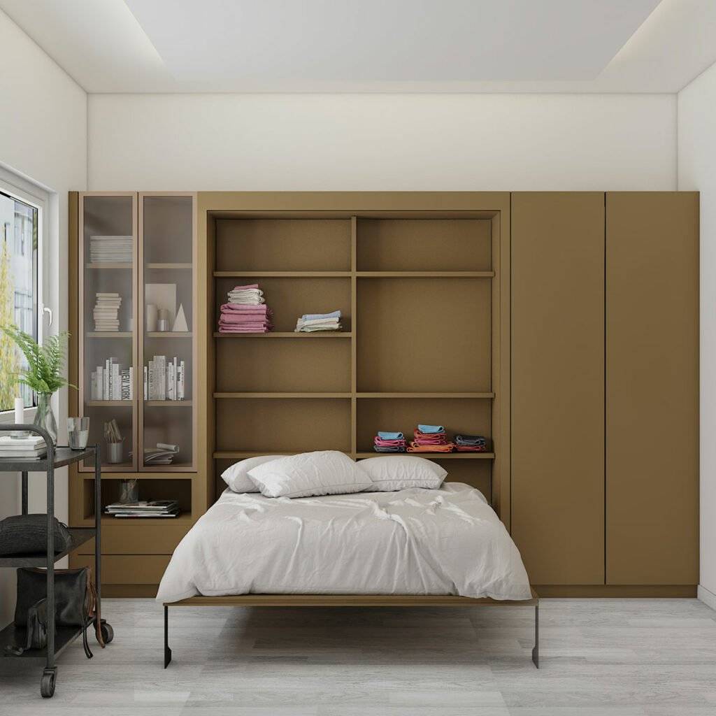 Wardrobe in the form of cabinetry around the wall folding bed to result in a full-size wall mounted murphy bed Wall folding bed design with a wardobe acts as a Murphy bed with invisible storage and space saving technique.