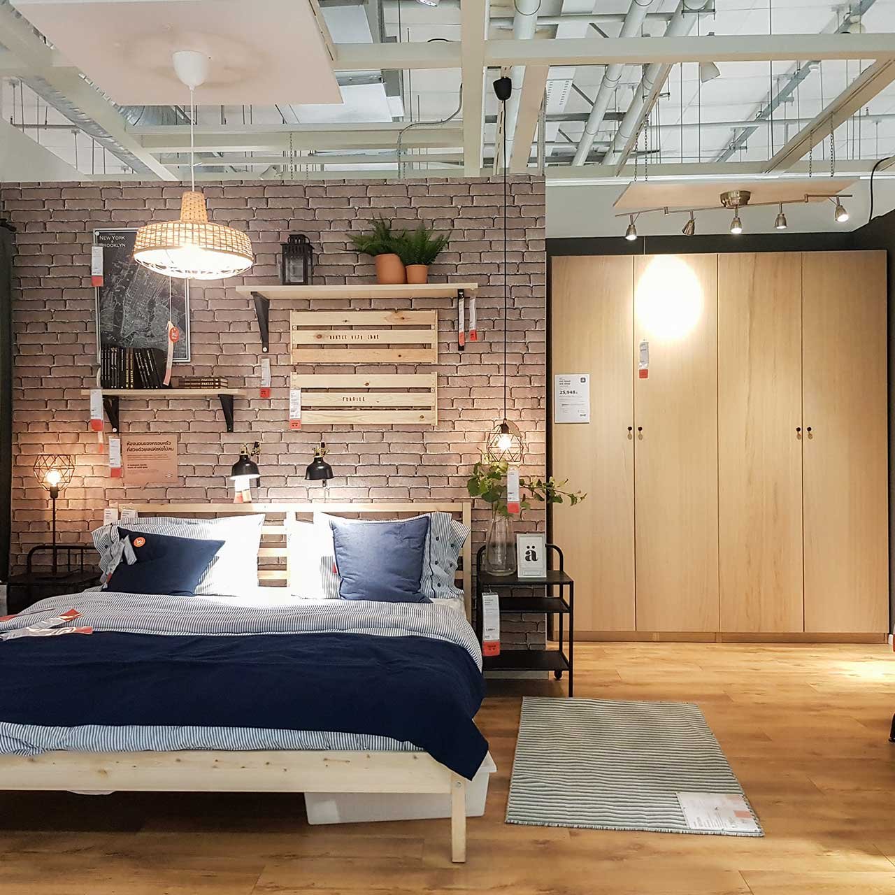 Industrial minimalist bedroom adorned with wooden wardrobe