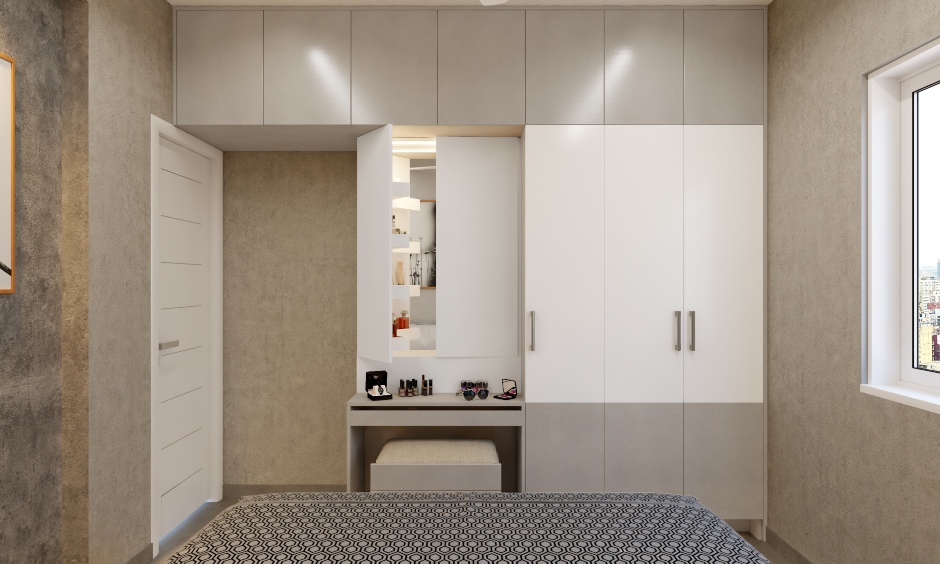 The wardrobe comes with a loft area in a 1bhk room design, modular storage units and an attached dresser