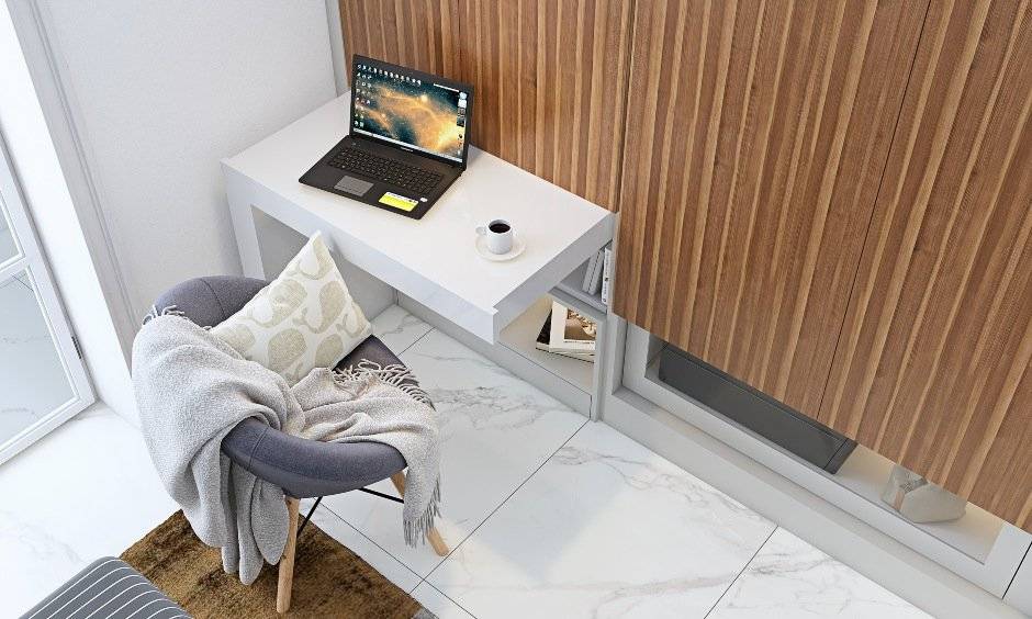 bedroom with pull out study table attached to wardrobe in 3 bhk home