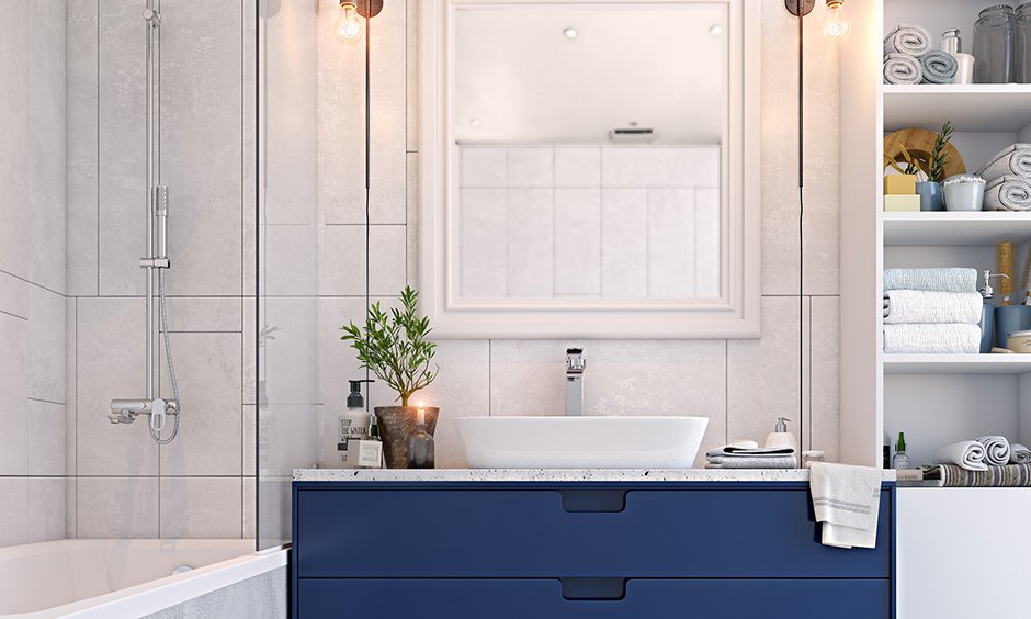 White and Navy bathroom colors make space an elegant and refreshing to look at.